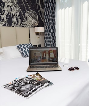 Standard Room, Multiple Beds, Balcony, Garden View