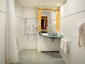 Accessible room with a double bed and a single bed