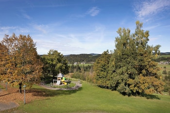 Junior Suite, 1 King Bed, Garden View (Balcony)
