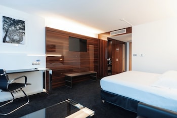 Chambre EXECUTIVE grand lit et canapé-lit pour enfant de 12 ans maximum