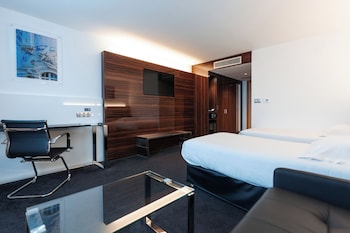 Chambre DELUXE grand lit et canapé-lit pour enfant de 12 ans maximum